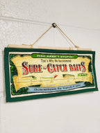 Sure-Catch Baits Quilted Wall Hanging – Hand-Guided Longarm Fiber Art (12″ × 6″)